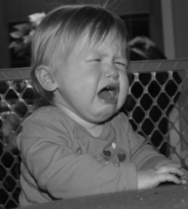 a crying baby to illustrate frustration with companies that exclude cannabis