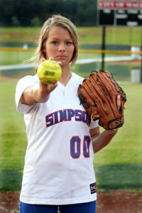 young woman with a softball to illustrate a pitch to the media of a cannabis business story