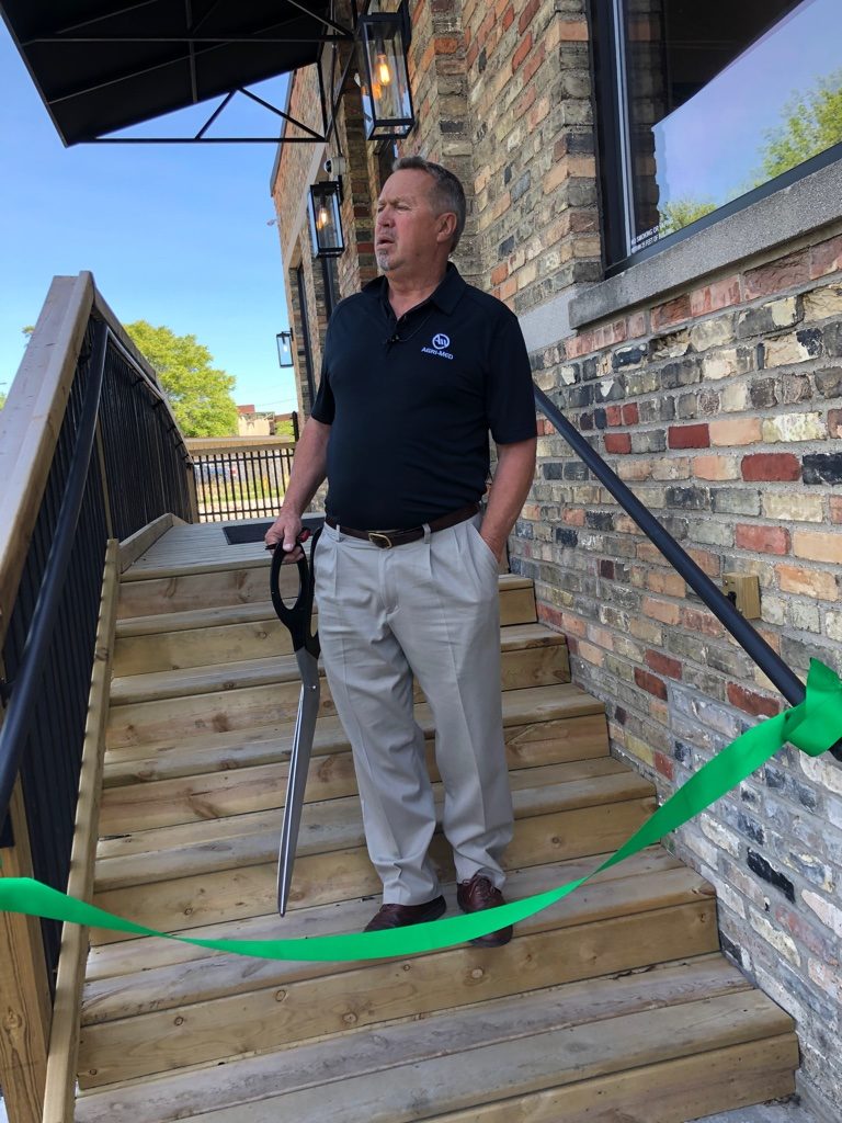 photo of Greg Maki at the grand opening of his provisionary center. Cannabis PR helped make the event a success by using PR for promoting a cannabis brand